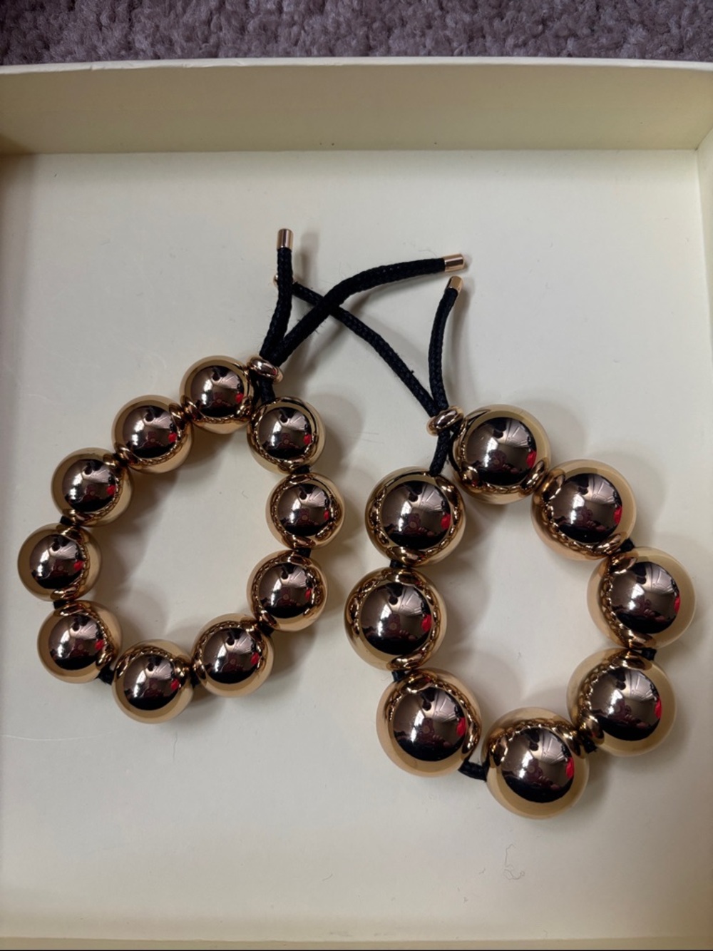 H&M Rose Gold Beaded Bracelet with Black Cord
